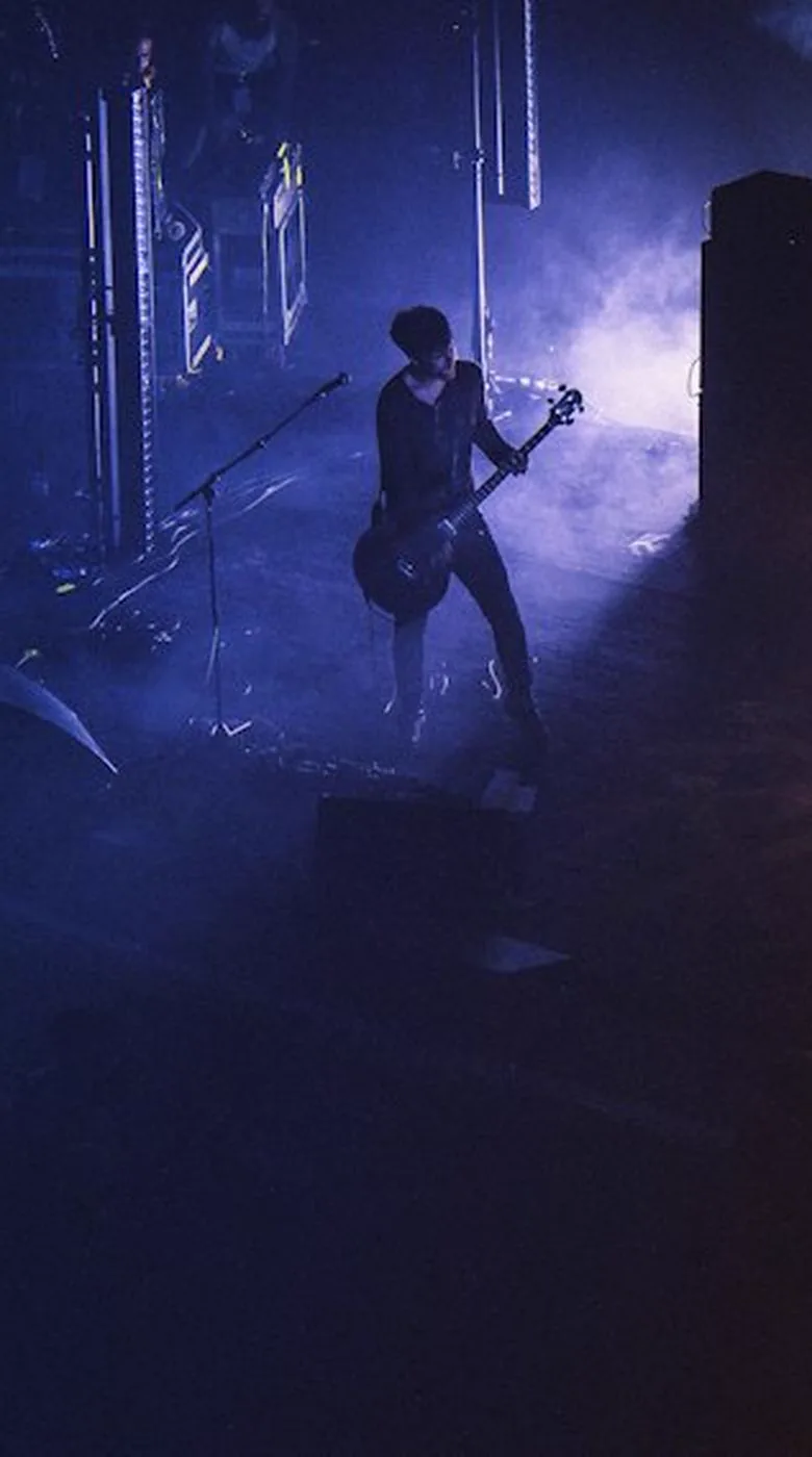 Support band on stage, wide shot